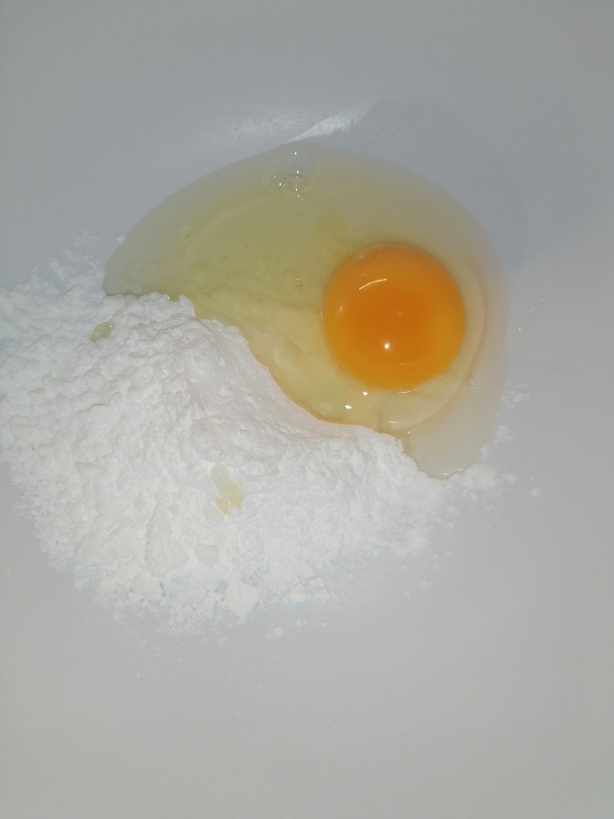 Sugar and eggs in mixing bowl