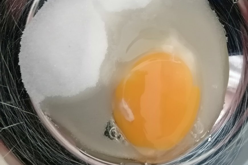 Whisk sugar and egg