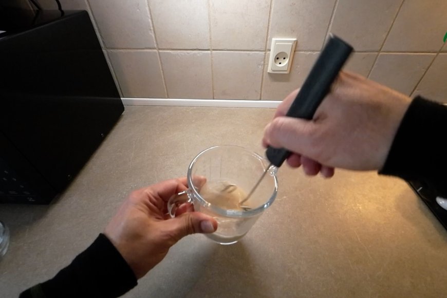 Whisk water and yeast