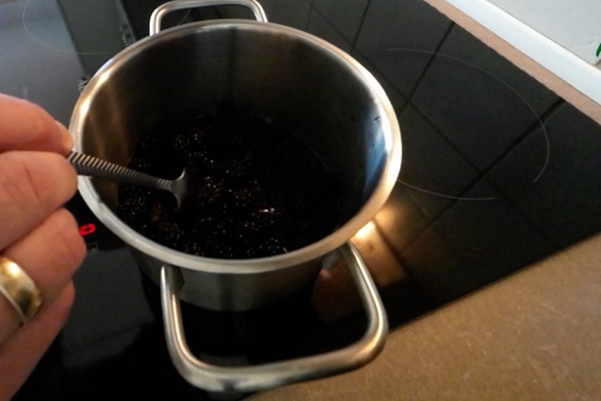 Berries into pot 